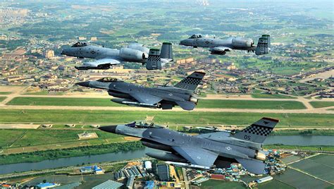 Osan air base - Osan and Kunsan air bases joined forces for a Mammoth Walk lining up on the runway F-16s, A-10s, U-2s and C-12s belonging to the units permanently forward-deployed in South Korea.